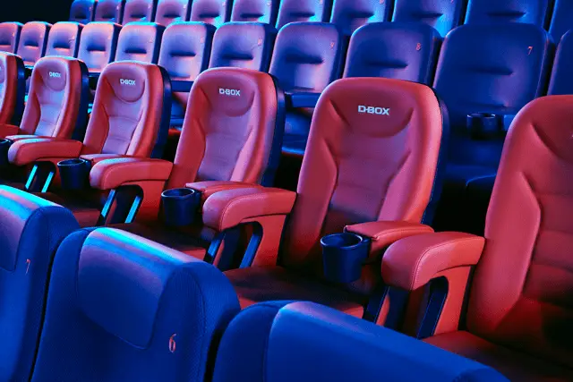 Dbox seats in red among other seats in the cinema